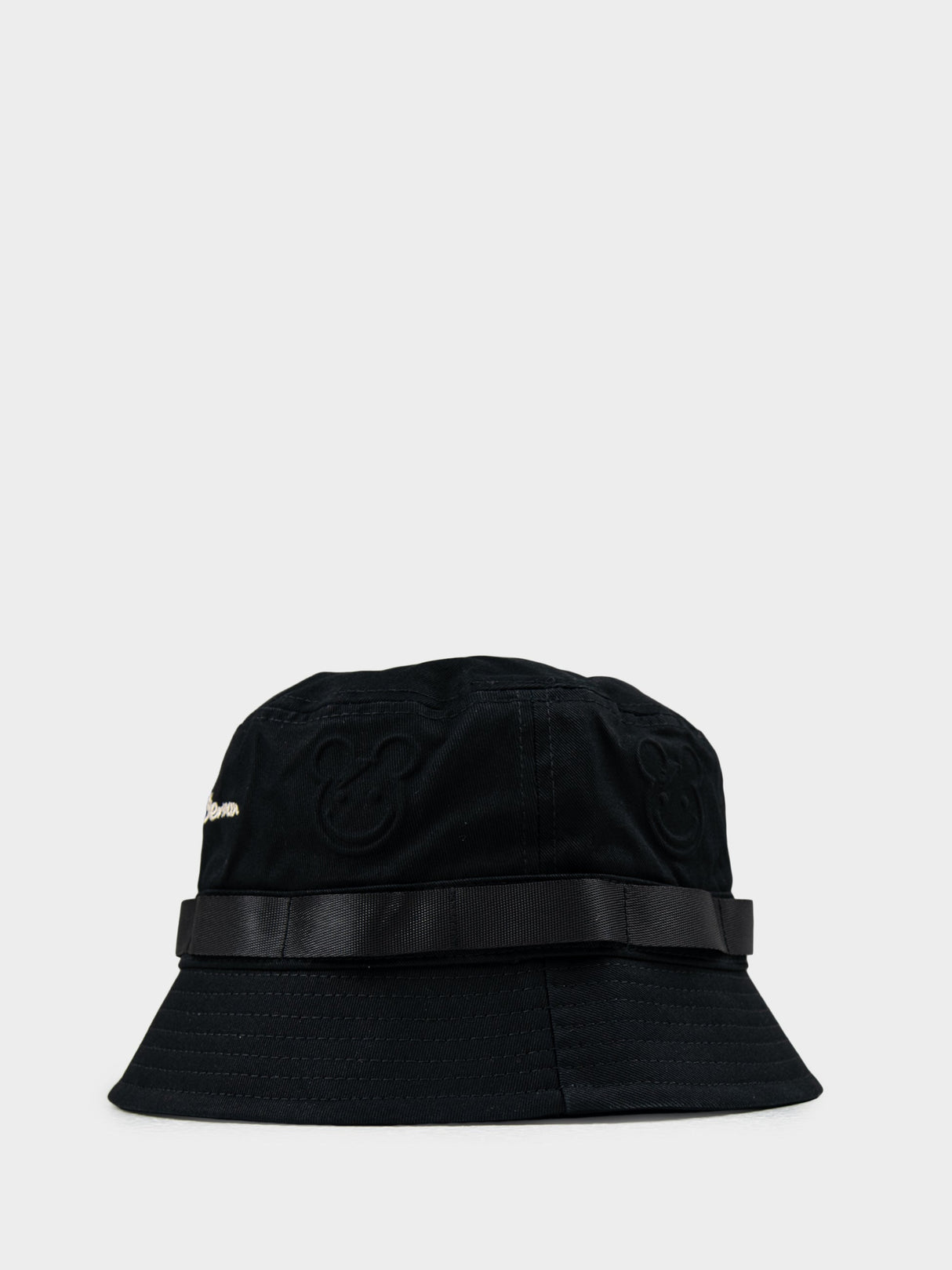 Ben Sherman Bear Embossed Bucket Hat in Black - side view with tonal leather band and bear emboss texture