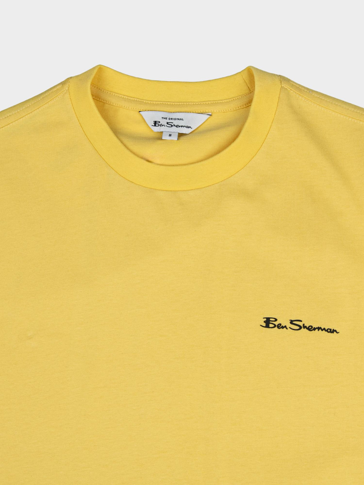 Ben Sherman Oasis Yellow T-Shirt - Close-up of crew neckline and embroidered Ben Sherman chest logo