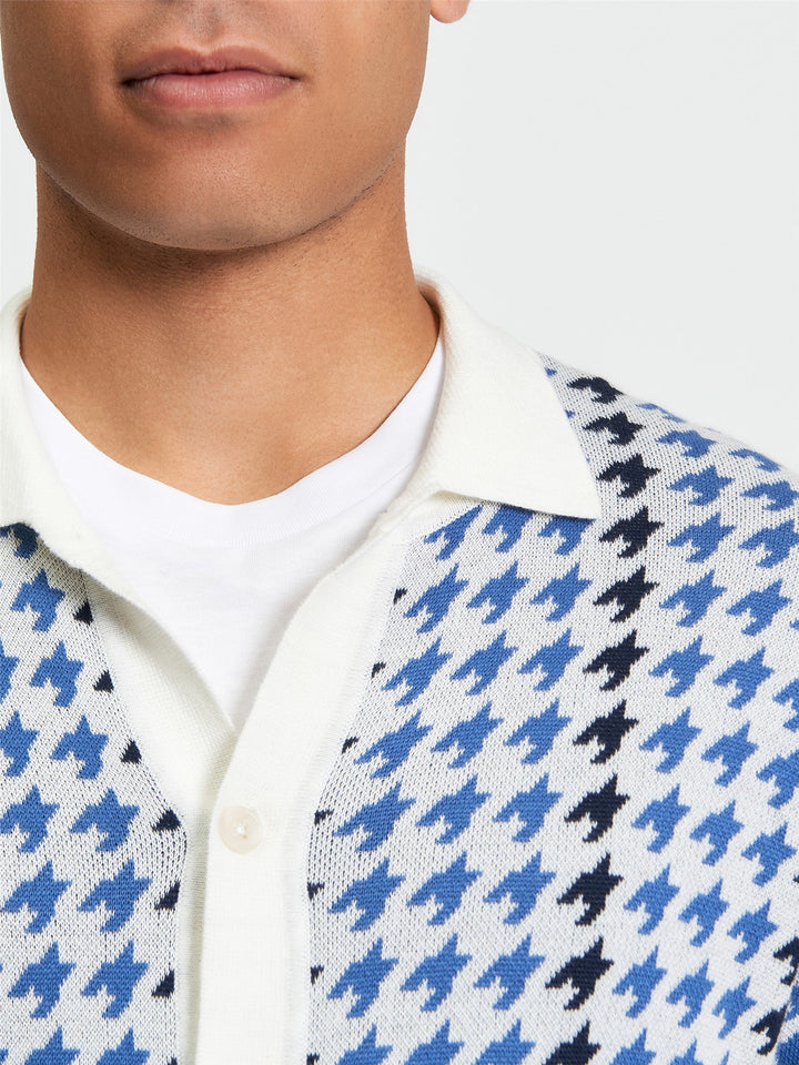 Ben Sherman Houndstooth Button Through Polo in Ivory - close-up of collar, button-through placket and bold blue and ivory houndstooth knit texture