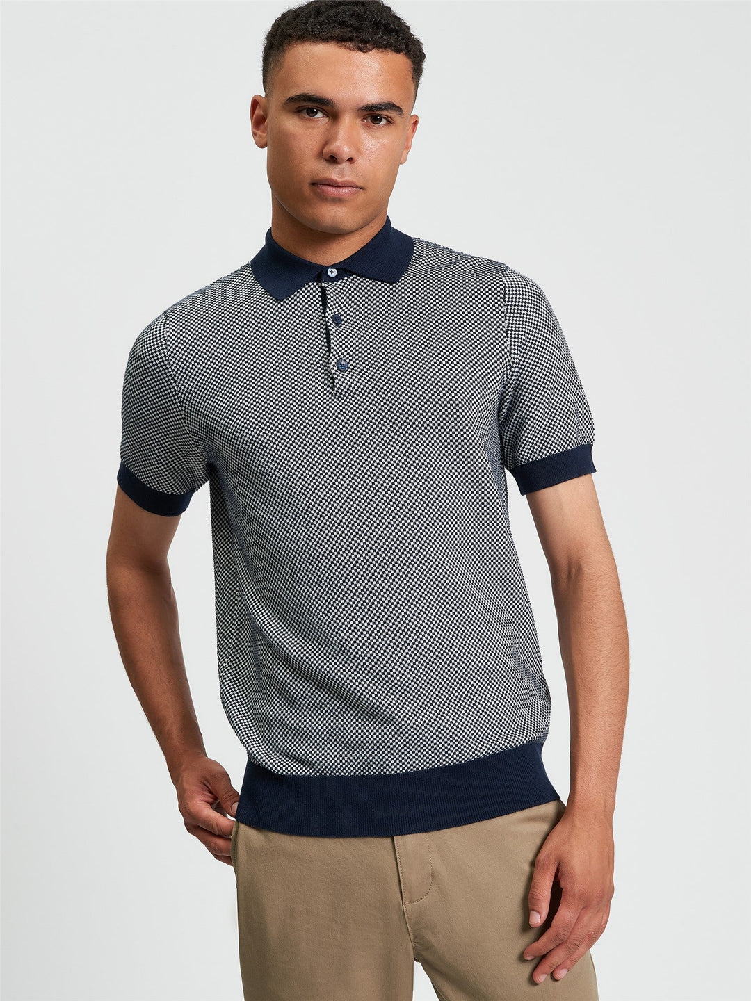 Ben Sherman Coloured Textured Polo in Dark Navy - model wearing front view showing duo coloured knit texture and navy collar