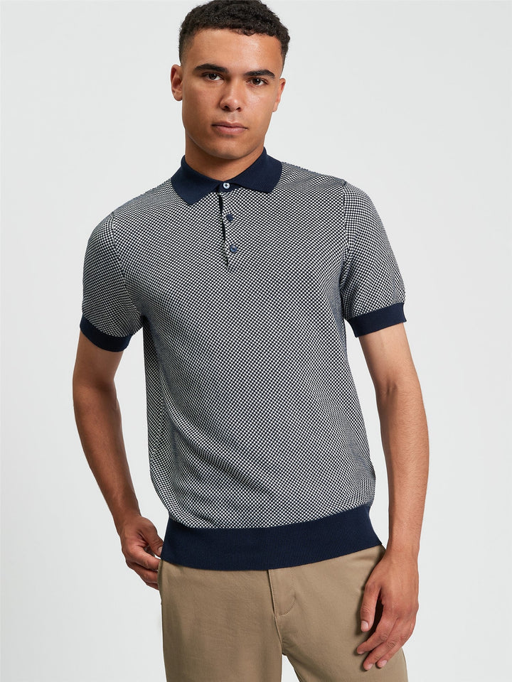Ben Sherman Coloured Textured Polo in Dark Navy - model wearing front view showing duo coloured knit texture and navy collar