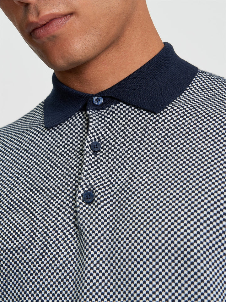 Ben Sherman Coloured Textured Polo in Dark Navy - close-up detail of navy polo collar button placket and textured knit fabric