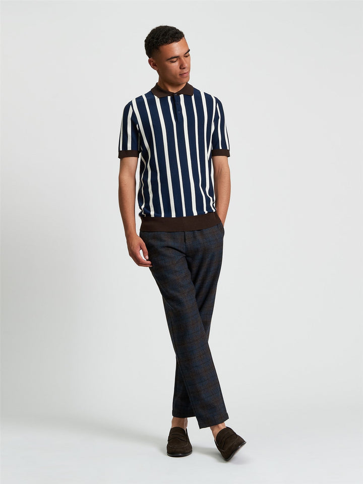 Ben Sherman Raised Stripe Polo in Dark Navy - full length side view showing regular fit knitted polo with bold vertical stripe design
