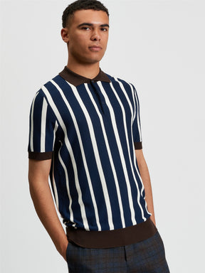 Ben Sherman Raised Stripe Polo in Dark Navy - model wearing front view showing bold vertical stripe knit design with contrast brown tipping detail
