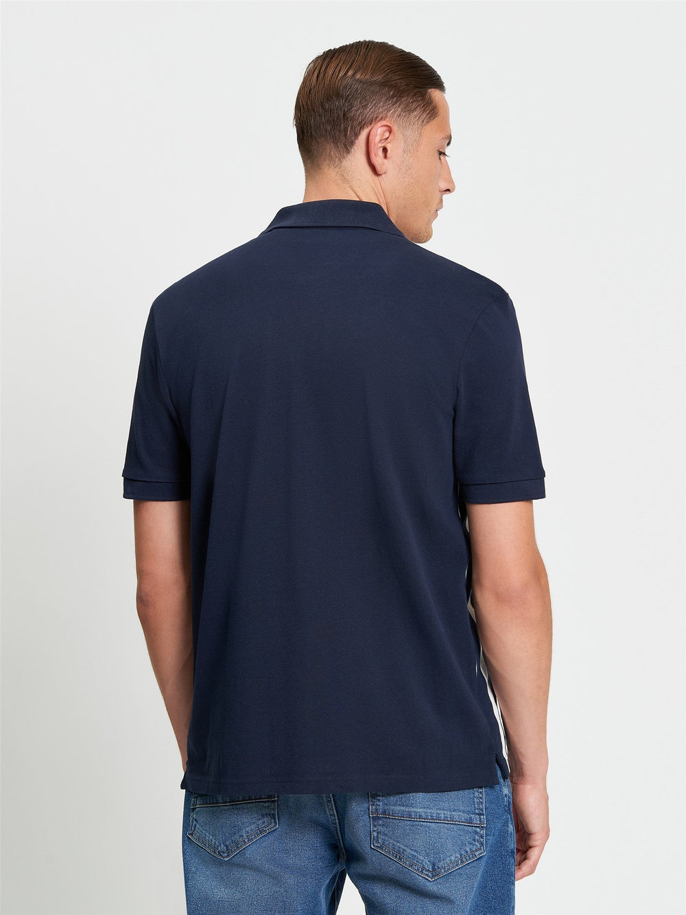 Ben Sherman Button Through Stripe Polo in Dark Navy - back view showing textured pique fabric and relaxed fit silhouette