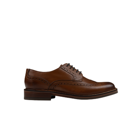 Chapman & Moore leather brogue in Tan – side view showing hand-burnished upper and classic brogue detailing