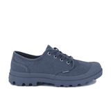 Palladium Pampa Oxford Vintage Indigo men's low-top sneaker – side profile, washed indigo canvas upper with matching outsole and lace-up closure
