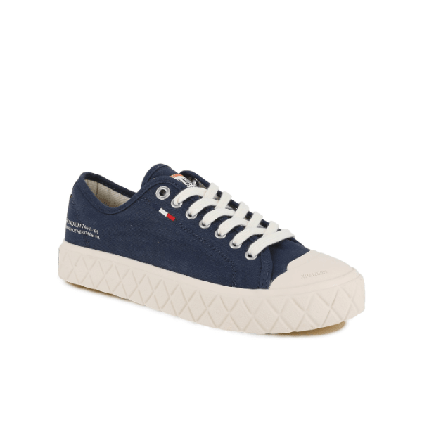 Palladium Palla Ace Washed CVS in Mood Indigo - angled front view showcasing washed canvas upper, lace-up closure and protective toe cap