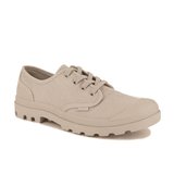 Palladium Pampa Oxford Pilat sneaker – front-angle view displaying textured beige canvas upper, four-eyelet lace-up closure and grippy rubber outsole