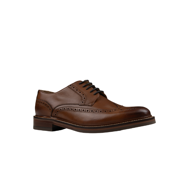 Chapman &amp; Moore leather brogue in Tan – angled view highlighting lace-up detail and brogue punchwork decoration