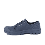 Palladium Pampa Oxford Vintage Indigo sneaker – 3/4 side view showing washed indigo canvas upper, Palladium branding and durable rubber outsole