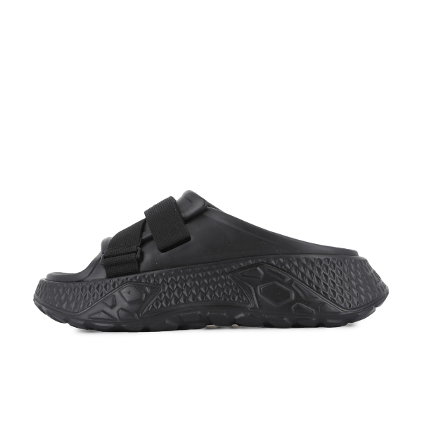 Palladium Offbound Slide in Black – angled view showcasing textured upper and velcro adjustable strap