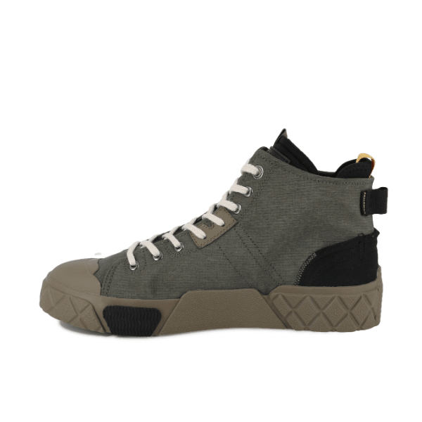 Ace City Shell Chukka Olive Night boot – outer side view showing ripstop texture, black accents and geometric outsole