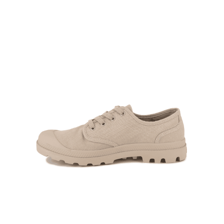 Palladium Pampa Oxford Pilat sneaker – 3/4 rear view showcasing tonal beige canvas construction, Palladium branding and molded rubber outsole
