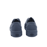 Palladium Pampa Oxford Vintage Indigo sneaker pair – rear view showing Palladium heel embossing, washed indigo canvas upper and rubber outsole