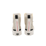 Pampa Hi Urban Taupe Rice boots pair - rear view showing signature red zigzag stitching and black heel tab