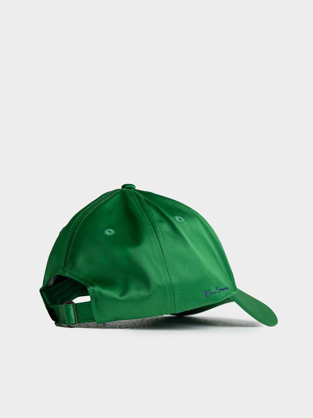 Ben Sherman B Bling Cap in Green - side profile view showing clean green structured cap with Ben Sherman script embroidery and metal adjustable buckle strap