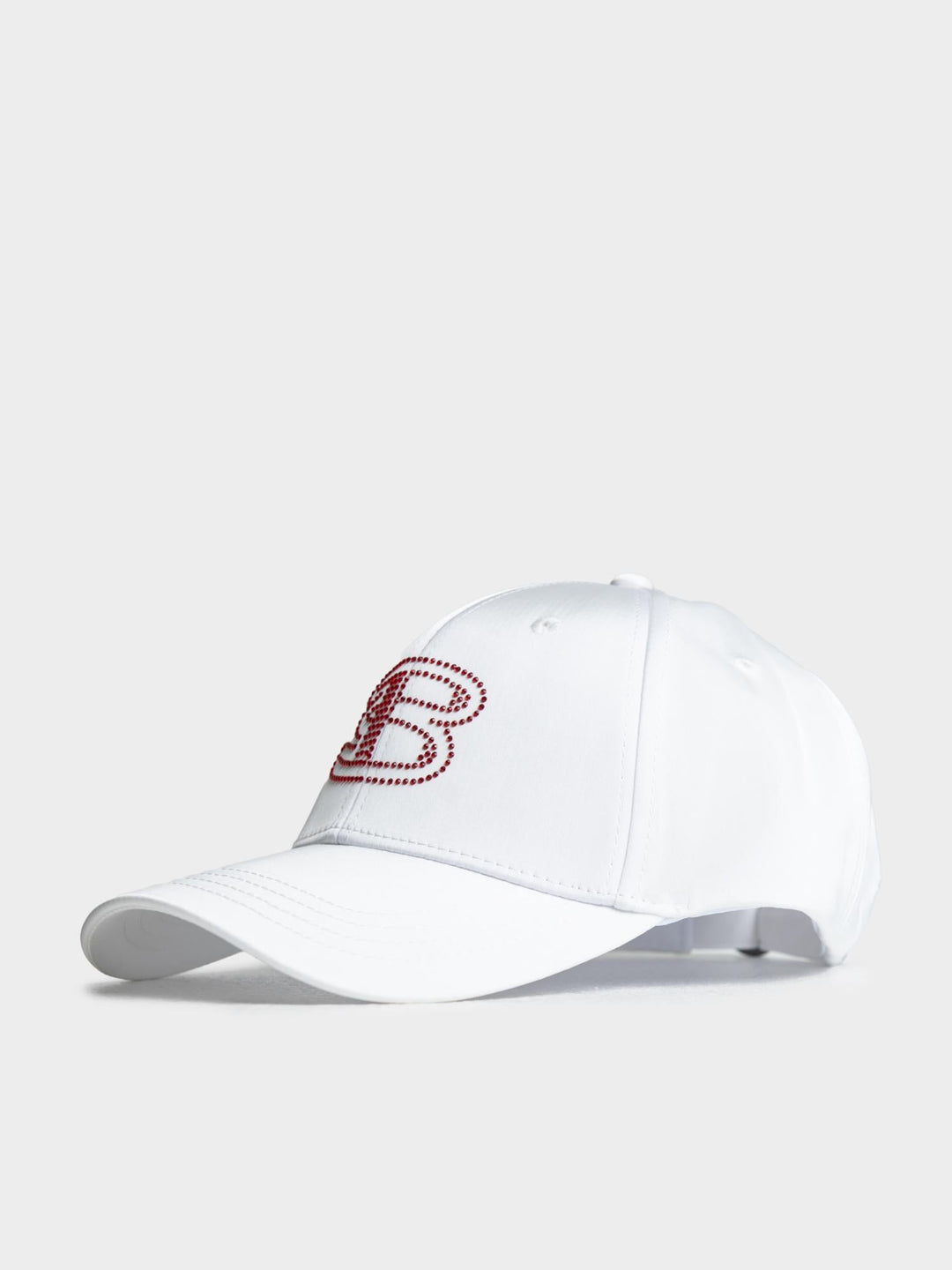 Ben Sherman B Bling Cap in White - side angle view showing rhinestone B logo embellishment on front panel with adjustable back strap
