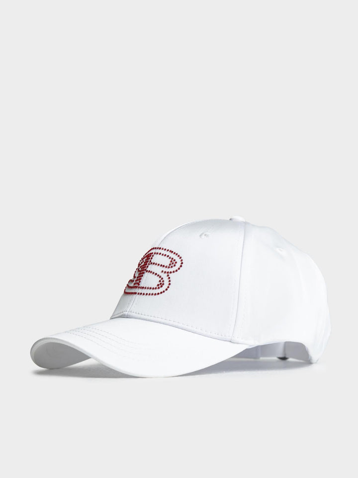 Ben Sherman B Bling Cap in White - side angle view showing rhinestone B logo embellishment on front panel with adjustable back strap