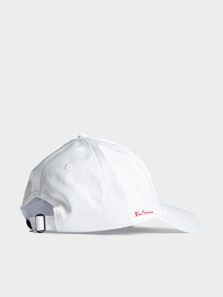 Ben Sherman B Bling Cap in White - side profile view showing clean white structured cap with Ben Sherman script embroidery and metal adjustable buckle strap