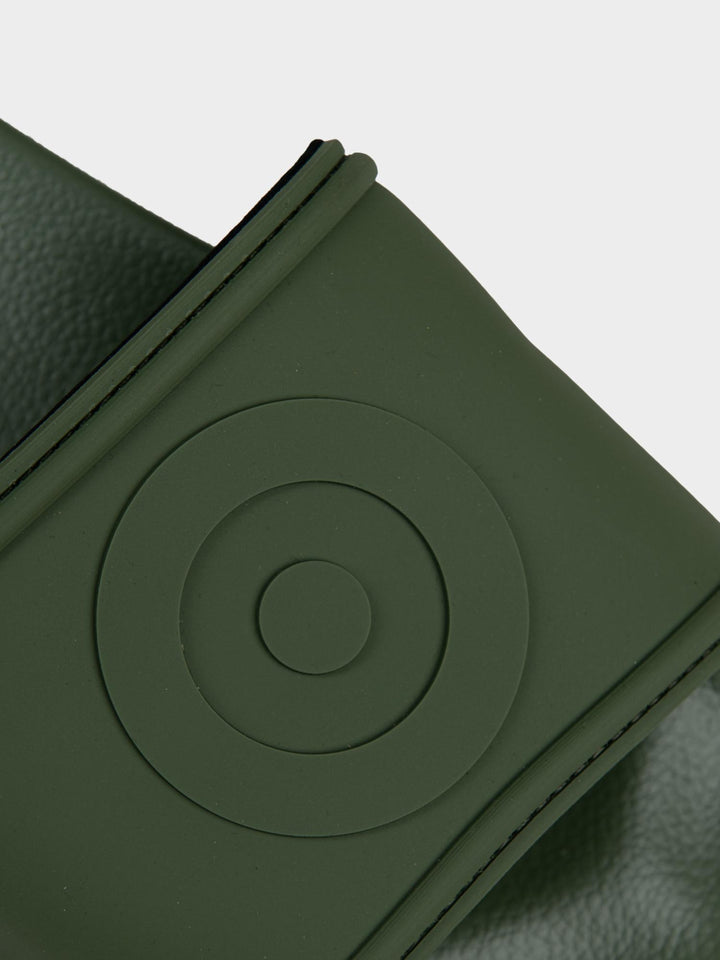Ben Sherman Target Embossed Slides – Close-Up of Embossed Target Circle on Olive Strap