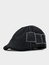 Ben Sherman Denim Dixie Cap in Black - front view, textured black denim flat cap with embroidered panel detailing