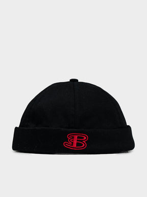 Ben Sherman Docker Hat in Black — front view showing cuffed cotton design with red embroidered B logo branding