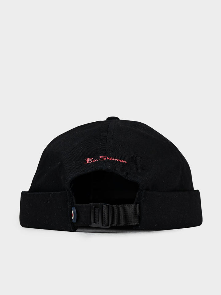 Ben Sherman Docker Hat in Black — back view showing Ben Sherman script detail, cuffed construction and adjustable buckle strap