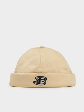 Ben Sherman Docker Hat in New Wheat — front view showing cuffed cotton design with embroidered B logo branding