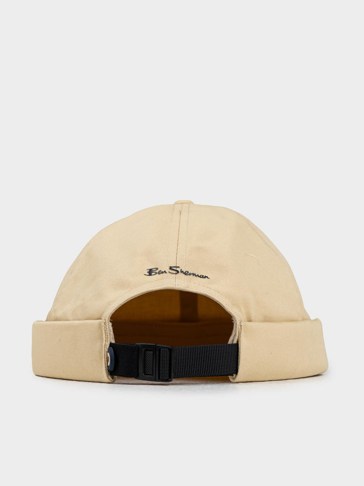 Ben Sherman Docker Hat in New Wheat — back view showing Ben Sherman script detail, cuffed construction and adjustable buckle strap