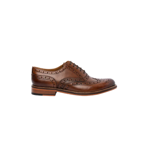 Chapman & Moore men's chocolate leather Oxford brogue with intricate brogue detailing, waxed laces and leather sole, side view