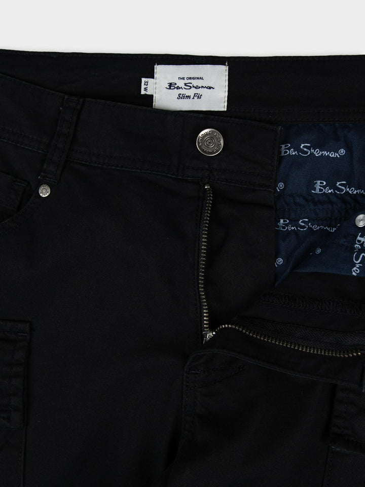 Ben Sherman black cargo pants waistband detail showing branded labels and slim fit lining