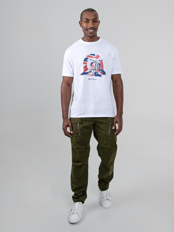 Model wearing Ben Sherman olive cargo pants styled with a white graphic tee - full outfit look