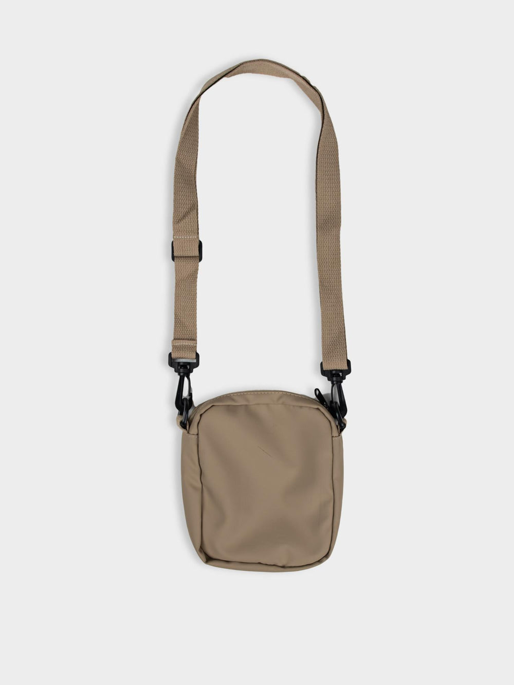 Side view of Ben Sherman Compact Crossbody Bag in Stone showing zip closure and adjustable strap detail