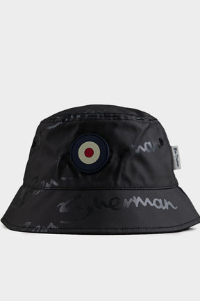 Ben Sherman reversible cotton bucket hat in Black – front view showing target logo and all-over embroidered script print