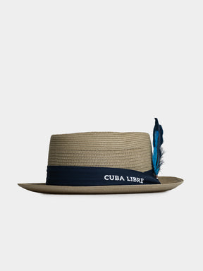 Cuba Libre Pork Pie Hat in Beige - lightweight woven straw, flat crown, narrow brim, navy band and feather accent