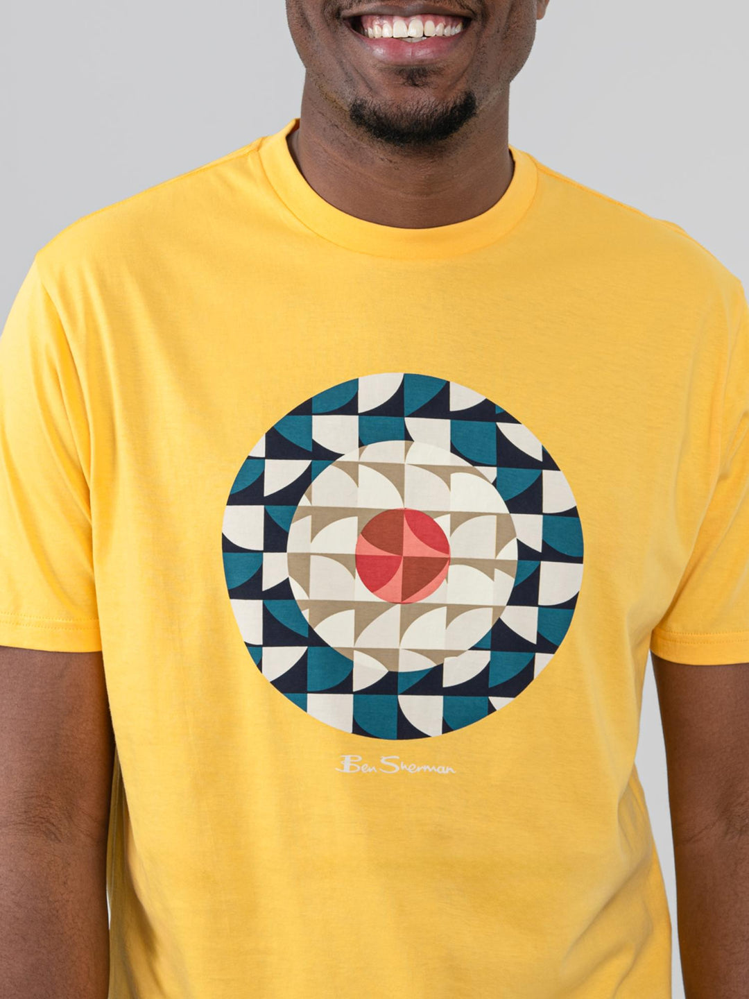 Close-up of Ben Sherman Geo Target T-Shirt in Banana yellow showing circular geometric print detail