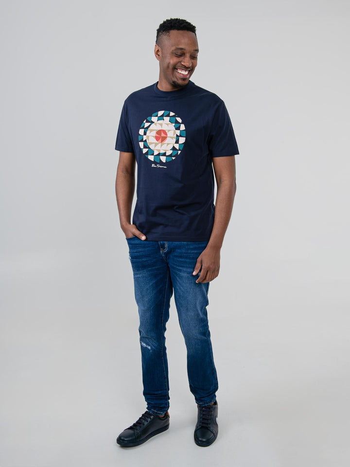 Man wearing Ben Sherman Geo Target T-Shirt in Navy — full-length front view with geometric print