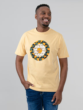 Man wearing Ben Sherman Geo Target T-Shirt in New Wheat with bold circular geometric print