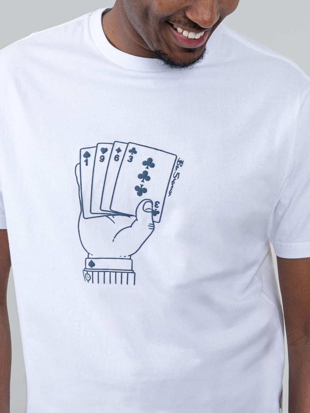 Close-up of Ben Sherman Hidden Ace T-Shirt White – detailed view of playing card hand graphic print on chest