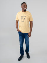 Ben Sherman Hidden Ace Tee in New Wheat - full-length front view of men's graphic t-shirt styled with jeans