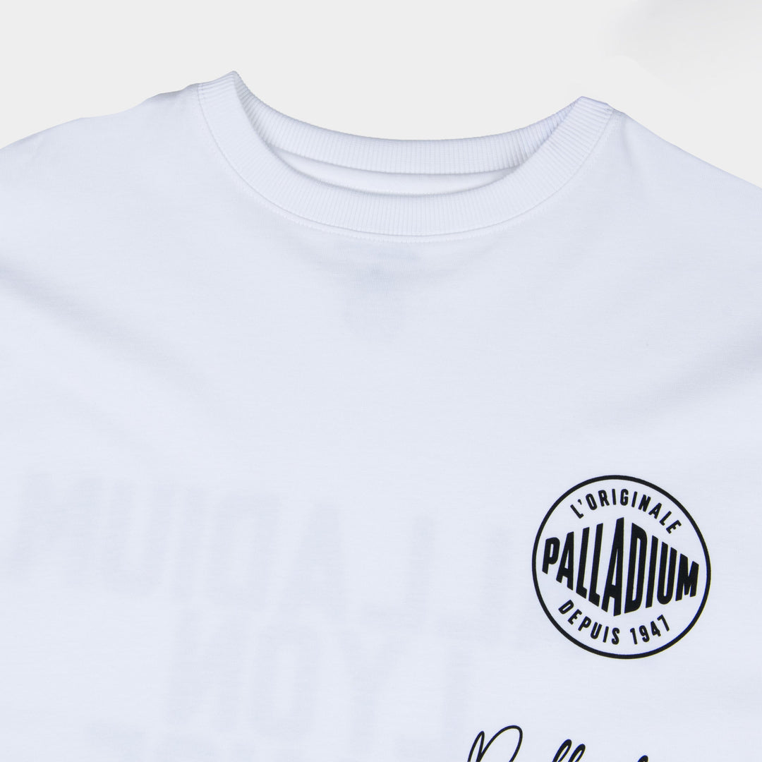 Partisan and Co Signature Oversized White T-Shirt - Close-up of iconic circular logo chest emblem, premium cotton