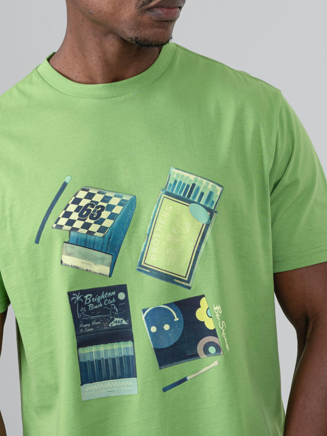 Ben Sherman Match Box T-Shirt in Piquant Green - close-up of vintage matchbook graphic print
