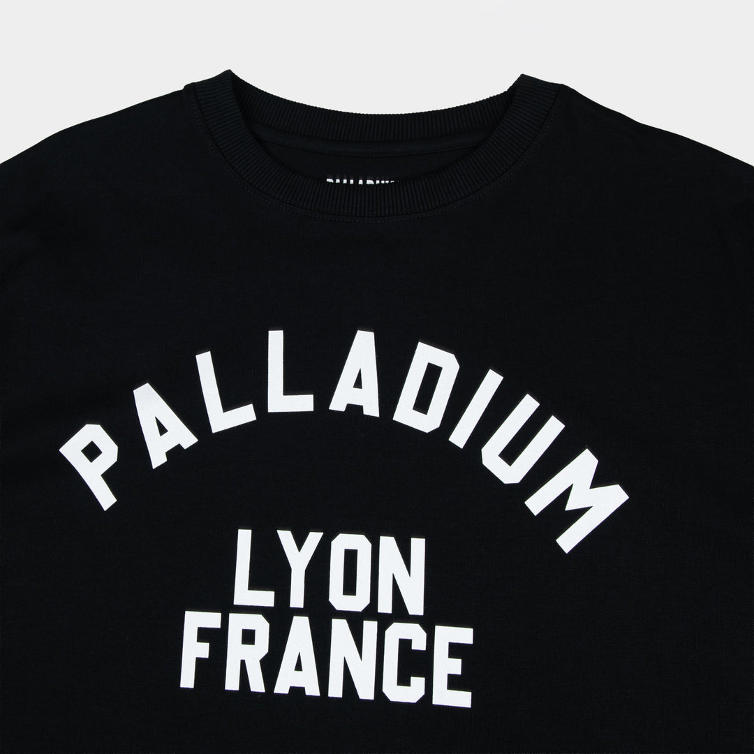 Lyon France Oversized Black T-Shirt - Close-up of varsity graphic chest print - Partisan and Co streetwear