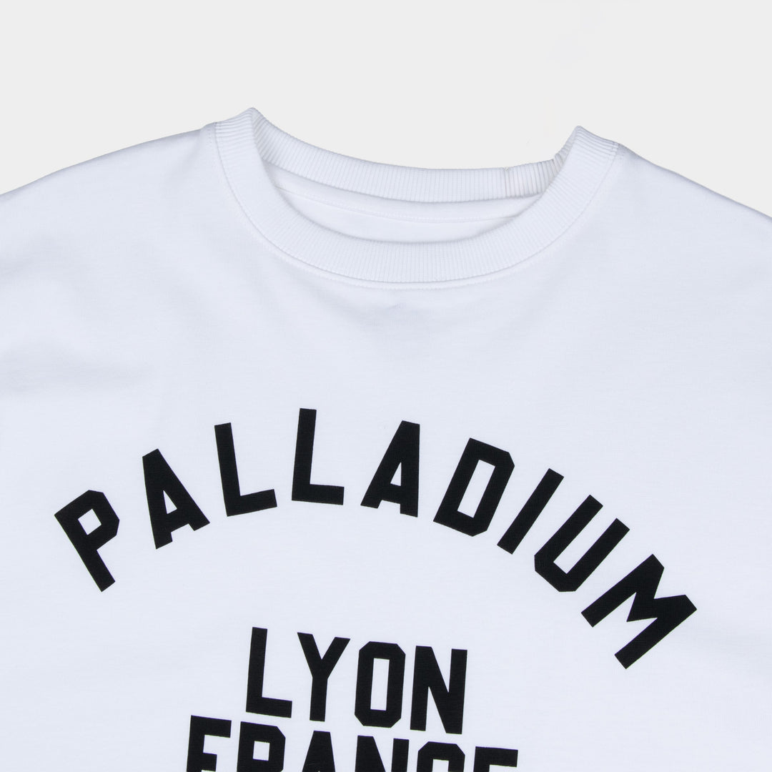 Lyon France Oversized White T-Shirt - Close-up of varsity graphic chest print - Partisan and Co streetwear