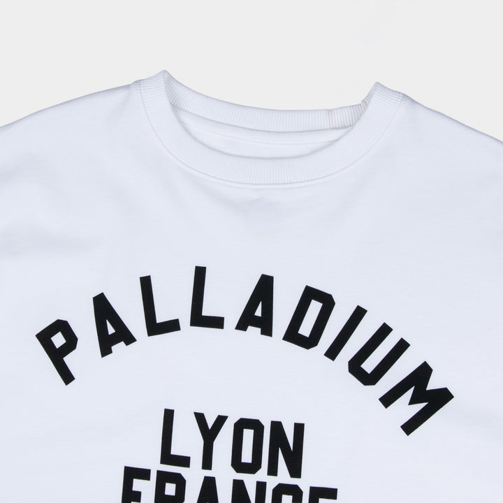 Lyon France Oversized White T-Shirt - Close-up of varsity graphic chest print - Partisan and Co streetwear