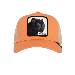 Goorin Bros Panther Trucker Cap in coral beige with black panther patch on front panel and mesh back with adjustable snapback