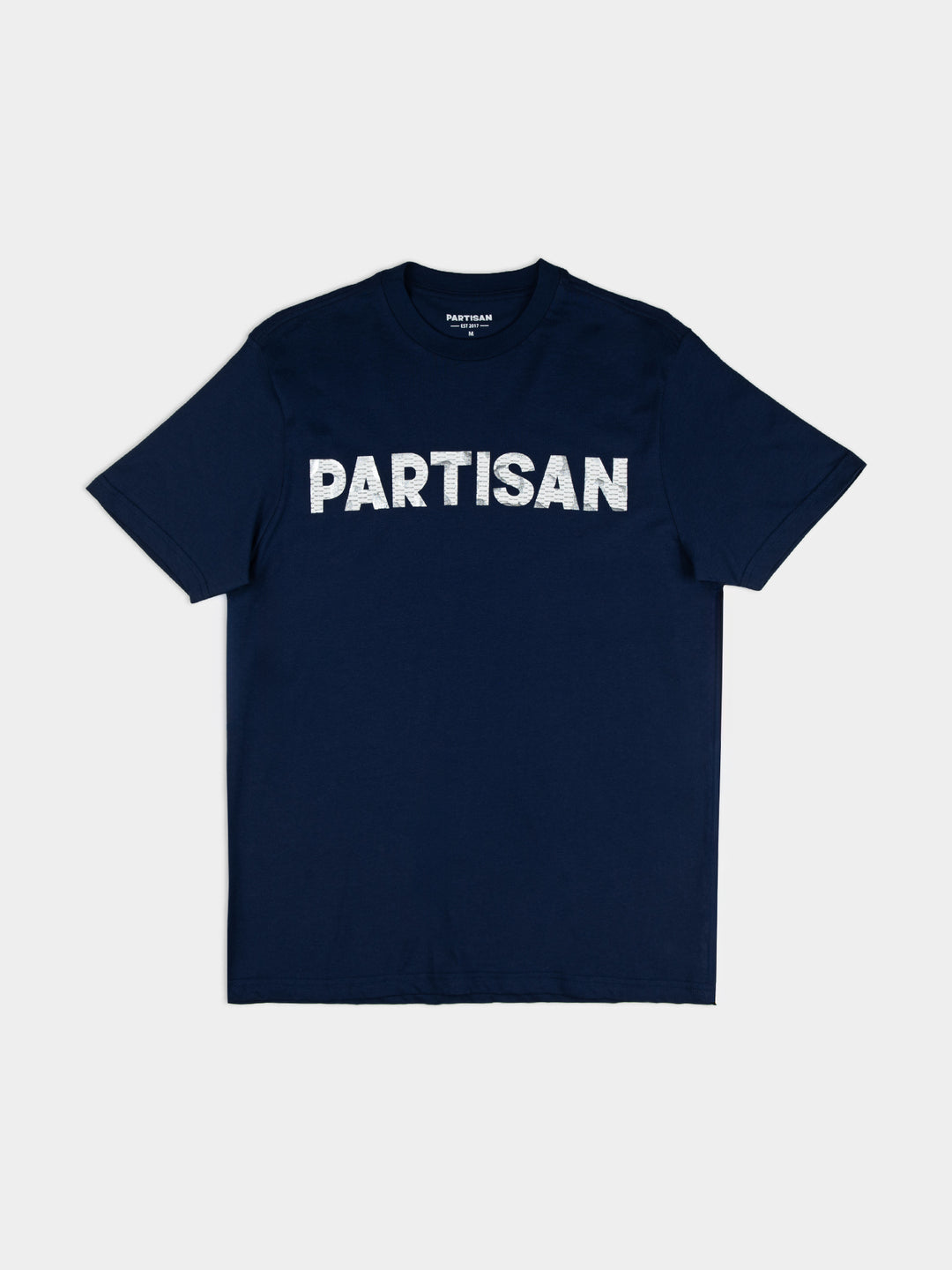 Partisan Foil Print T-Shirt in Navy — bold metallic foil logo print across the chest on a deep navy blue tee