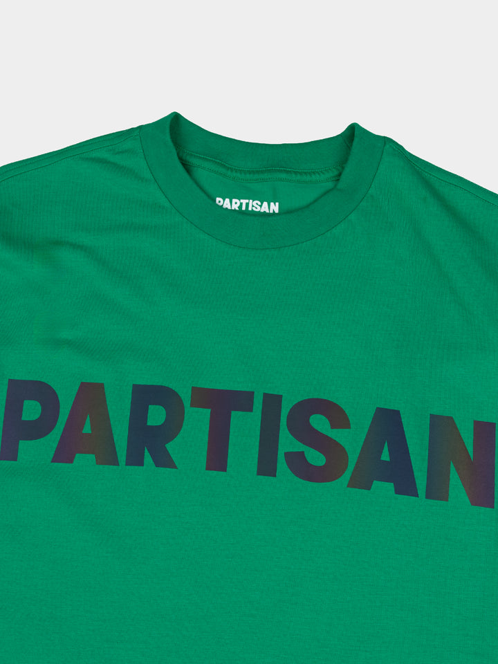 Partisan Reflective Print Tee in Staford Green – close-up detail of the light-shifting reflective chest logo on green streetwear t-shirt by Partisan and Co