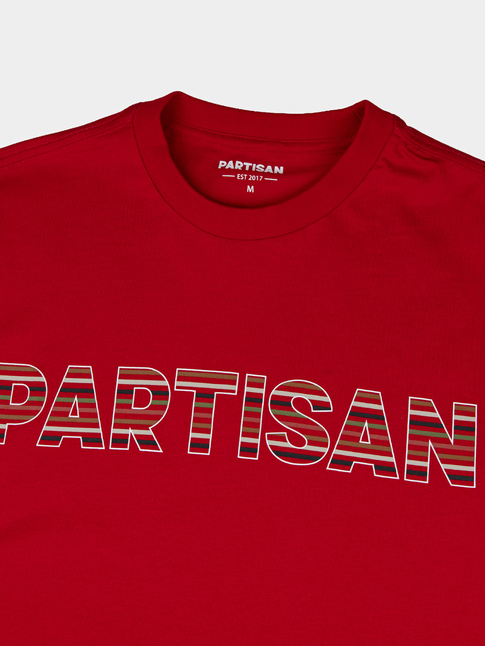 Partisan Stripe Print Tee in Red – close-up of tonal stripe print logo detail by Partisan and Co